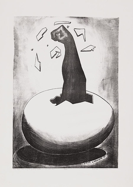 A black arm with a clenched fist breaks through the shell of an egg, spreading shattered eggshell as it pumps upward.